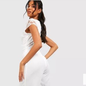 ♥️NWT White Lace V low Neck Jumpsuit PLUNGE LACE WIDE LEG.
